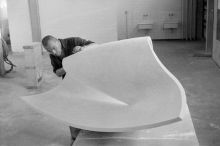 Max Bill working on a plaster sculpture 