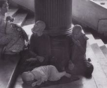 Begging nuns on the flight of steps to the Shwedagon-Pagoda in Rangoon