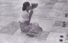 Woman praying before the Pagoda, Rangoon