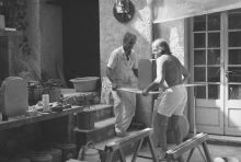 Chillida with his assistant and a sculpture ready for firing 