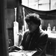 Giacometti painting in his studio in Paris 