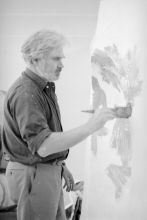Wilfrid Moser working on a painting