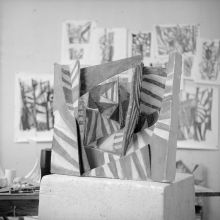 A painted cardboard model for a sculpture
