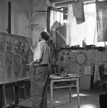 Brauner working on a canvas